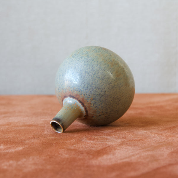 Modernist ball-shaped vase designed by Carl-Harry Stålhane and produced by Rorstrand, Sweden in the 1950's showing their Modernist aesthetic