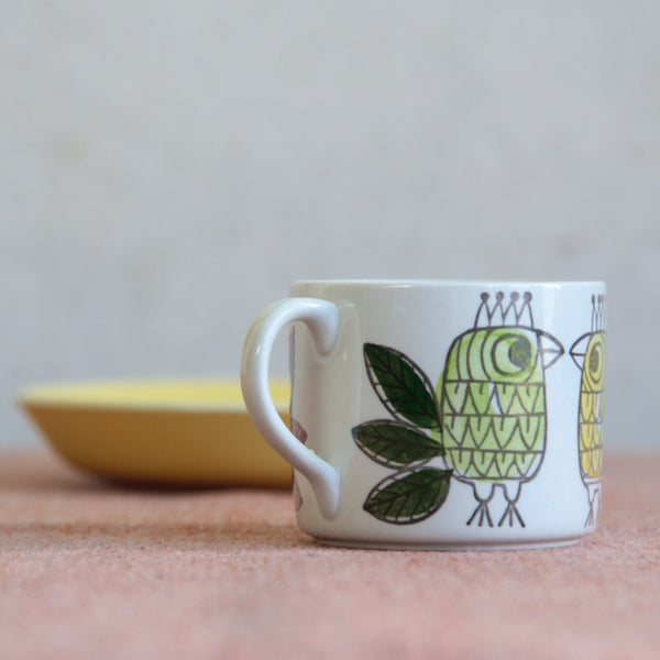A mid-century Rörstrand porcelain cup and saucer with Westman’s King pattern — a joyful and rare collectible produced only between 1964 and 1965.
