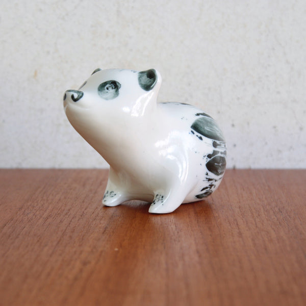 Gloss-glaze porcelain bear sculpture with organic leaf decoration by Susan Parkinson.