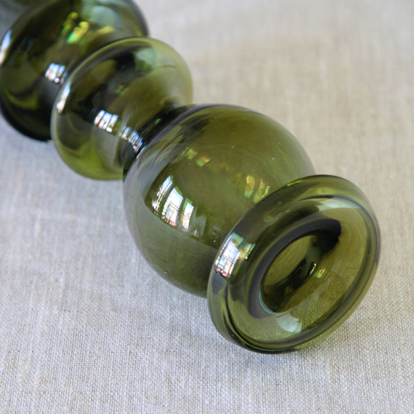 Detail of Nanny Still model 1404 vase in deep olive green glass