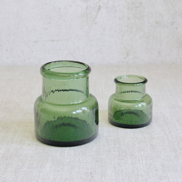 Top down Sculptural Neptuna glass vases designed by Nanny Still, showcasing rippling optical texture inspired by historic glassblowing methods.