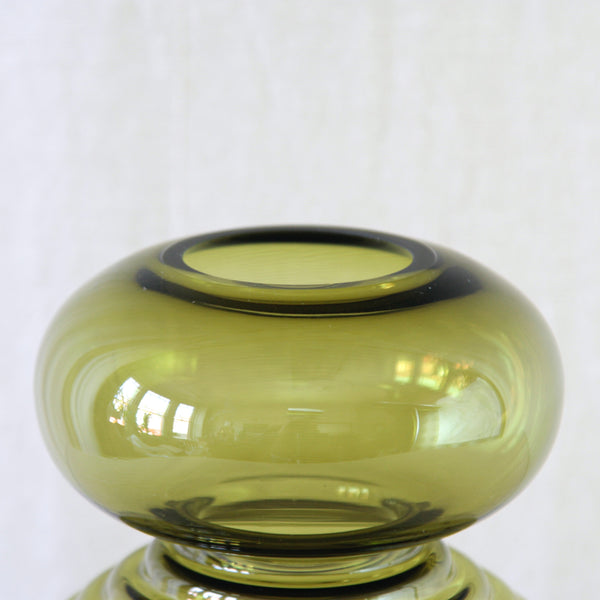Close-up of Space Age Tiimalasi vase by Nanny Still for Riihimäki, combining inflated curves, strict symmetry and bold horizontal ribbing.