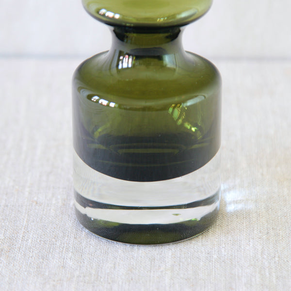 Detail of clear foot on olive green vase by Nanny Still for Riihimäki from the 1960s. 