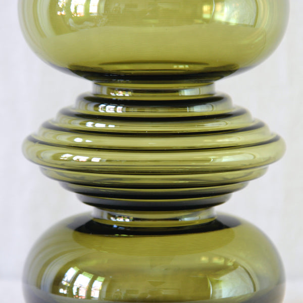 1970s Finnish glass vase by Nanny Still, with a distinctive sculptural Space-Age form in richly coloured olive green glass.