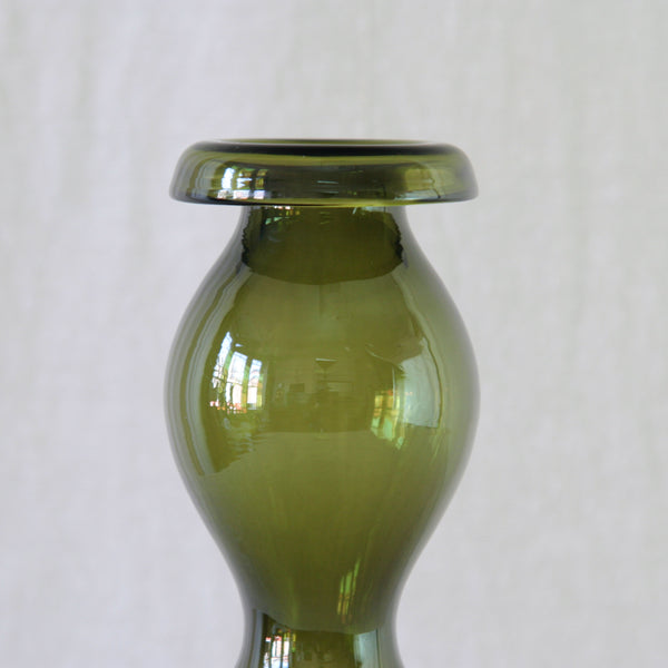 Close-up of Nanny Still Pompadour 1404, a distinctive example of Scandinavian Modern glass with a slender undulating profile.