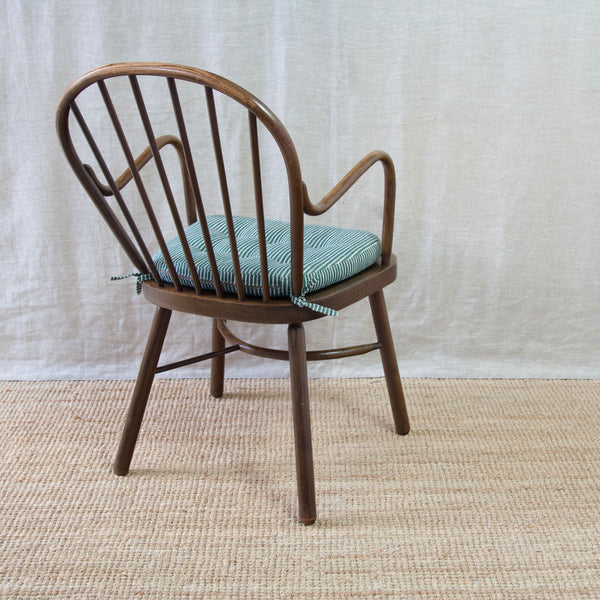A Niels Eilersen Windsor chair, epitomising midcentury modern Scandinavian style.
