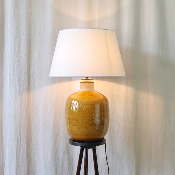 Glossy yellow-ochre glaze Nils Kähler stoneware table lamp made by HAK Kähler in Denmark.