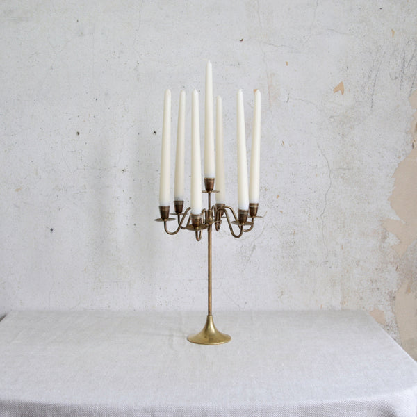 Swedish seven-headed brass candelabra, mid-century Nordic design. A 1950s classic with refined craftsmanship.