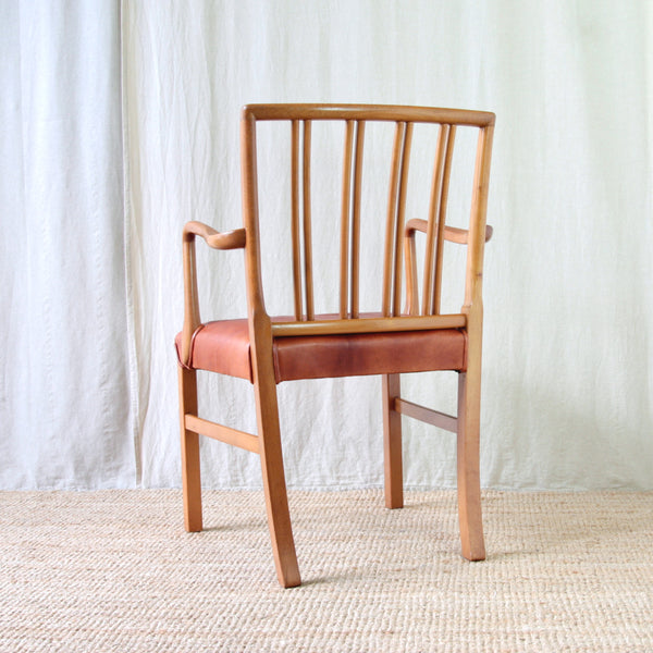 1940s Danish Modern furniture by Ole Wanscher, Model 1675 carver chair manufactured by Fritz Hansen in beech and leather.