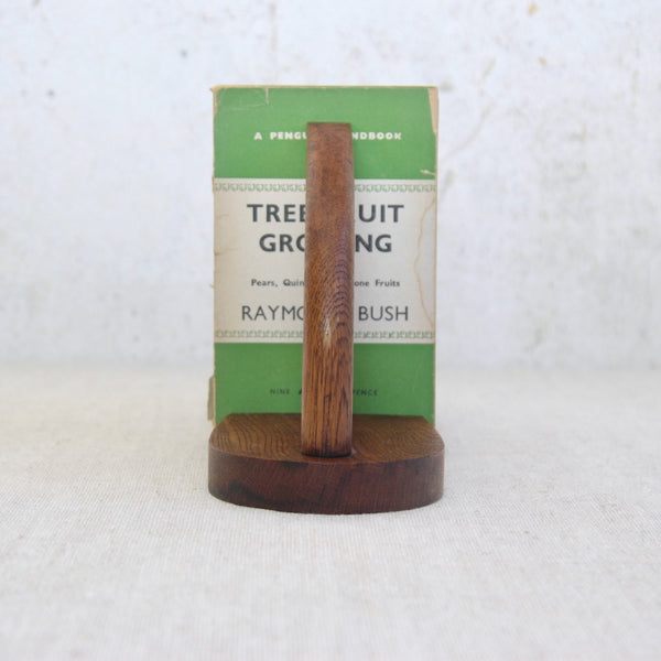 Sculptural oak horse bookends from England, vintage mid-century design celebrating craftsmanship and material beauty.