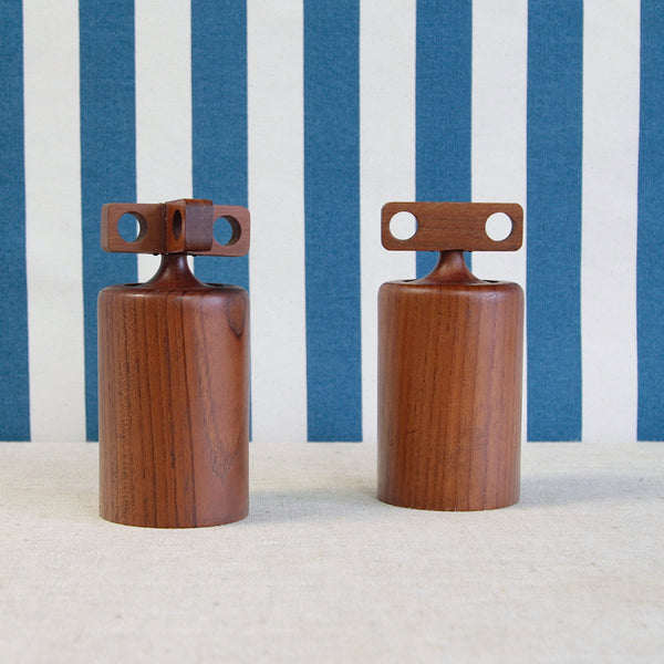 Two cylindrical teak wood salt and pepper mills /grinders with knops reminiscent of crosshead tap handles, designed by Birgit Krogh for Woodline, Denmark, circa 1960.