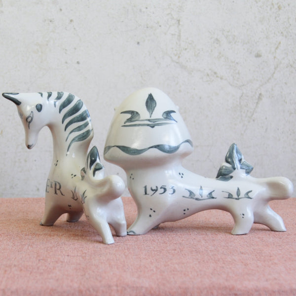 Iconic black and white ceramic lion and unicorn by Susan Parkinson, early 1950s British studio pottery design.