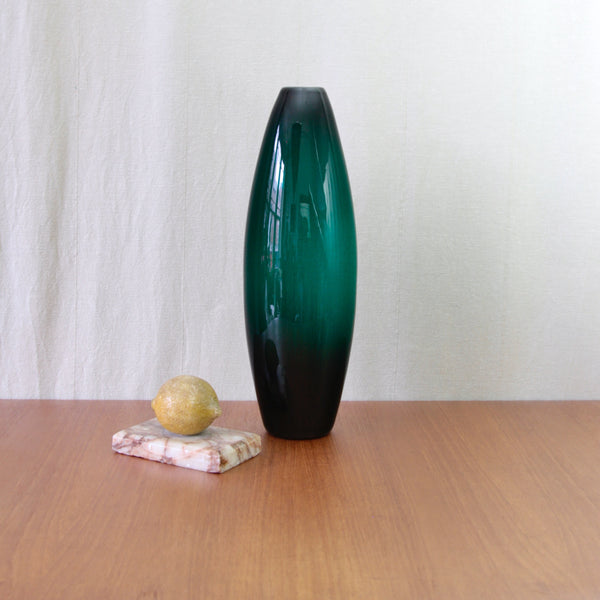 Per Lütken model 17660 Grønland vase for Holmegaard, a colossal 41cm dark green glass design with a dramatic torpedo-shaped form.