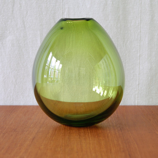 Per Lütken green Drop Vase for Holmegaard, designed in 1955 with a small base and softly swelling hand-formed body.