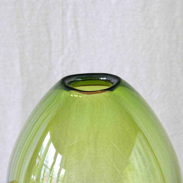 Detail of Per Lütken Dråbevase in Majgrøn glass, model 15470, a collectible Holmegaard Danish design for sale in the UK.