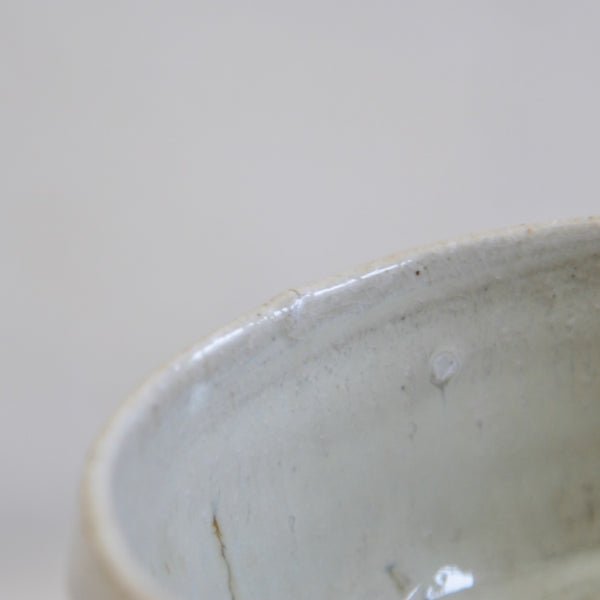 Close-up of a Phil Rogers chawan featuring thick interior nuka glaze.