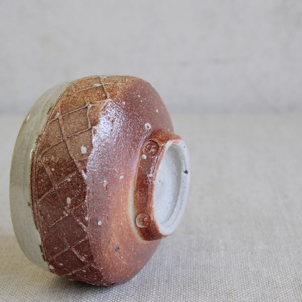 Textured lattice-pattern wheel-thrown chawan crafted by Phil Rogers with refined  proportions.