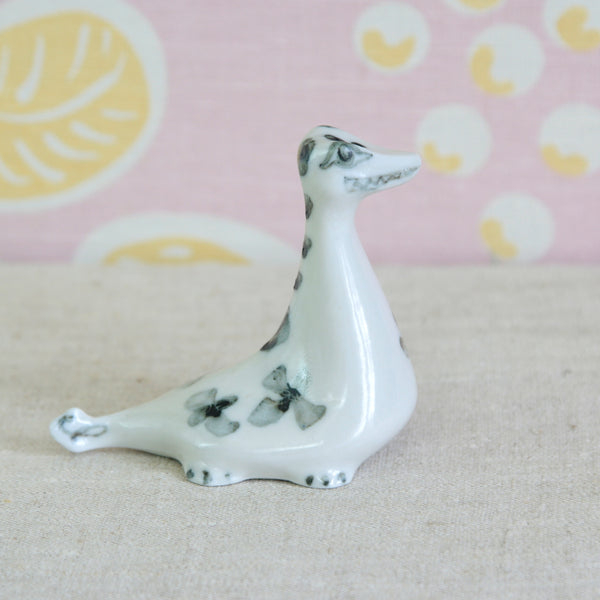 Picassoette inspired 1950s British porcelain ceramic figurine of a Loch Ness Monster. Susan Parkinson's Nessie is a brilliantly playful Modernist design from Post-War Britain