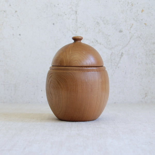 Staved pine acorn-shaped storage box designed by Erik Höglund for Boda, Sweden, circa 1960, showcasing Scandinavian mid-century craftsmanship.