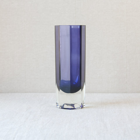 Profile image of a tall octagonal model 298 vase in purple designed by Kaj Franck in 1964 for Nuutajärvi Notsjö, Finland.