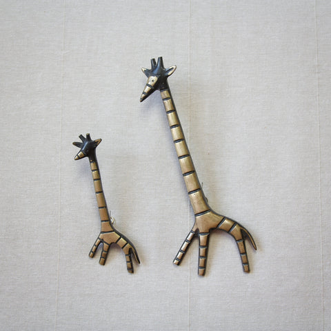 Lead image of a rare set of two giraffes, mother and calf. This scarcely seen design was executed by Walter Bosse circa 1950, and produced by Herta Baller around 1950 also. For sale in London from design gallery Art & Utility.