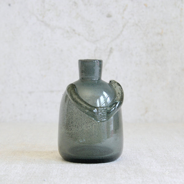 Scandinavian Modernist figure bottle by Erik Höglund, produced by Boda and celebrated for its handcrafted character and artistic originality.