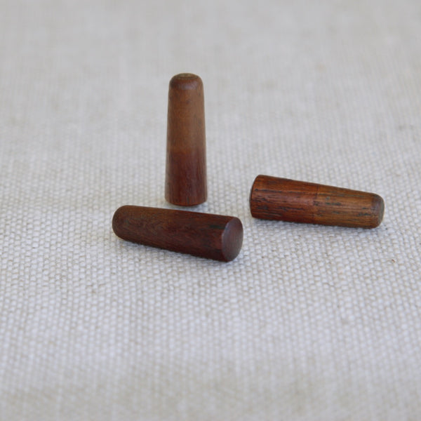 3 teak wood pegs from an original Jens Quistgaard Danish modern peppermill by Dansk Designs, minimal Scandinavian mid-century aesthetic.