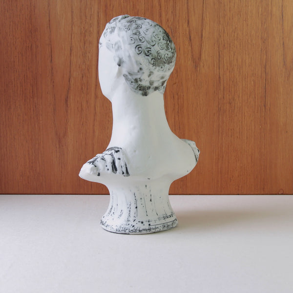 The back of a Modernist porcelain bust by Susan Parkinson, a refined interpretation of classical antiquity in mid-century British pottery.
