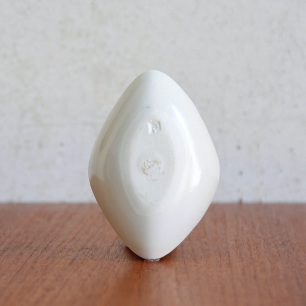 Underside of Susan Parkinson hand-painted dish with fine line and dot decoration, available for sale in the UK from Art & Utility. Photo shows Richard Parkinson Pottery makers mark stamp.