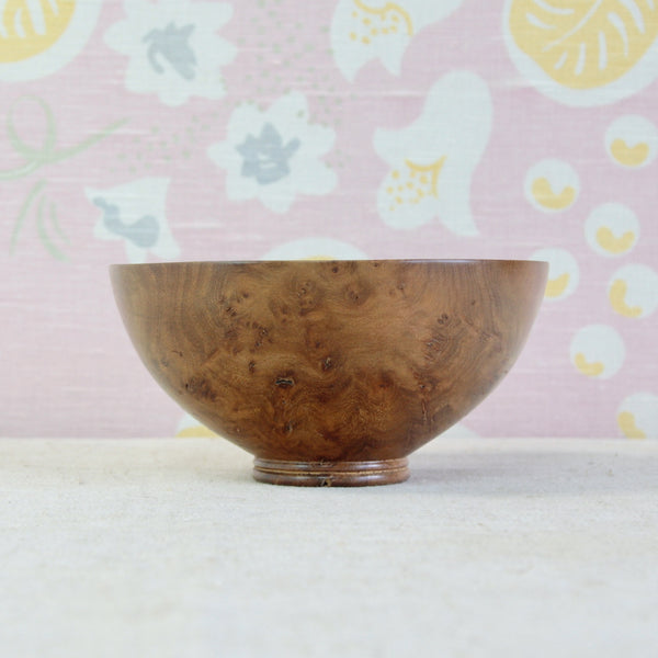 Richard Raffan hand-turned wooden bowl in dramatically figured elm burr, with the natural grain providing the principal decoration.