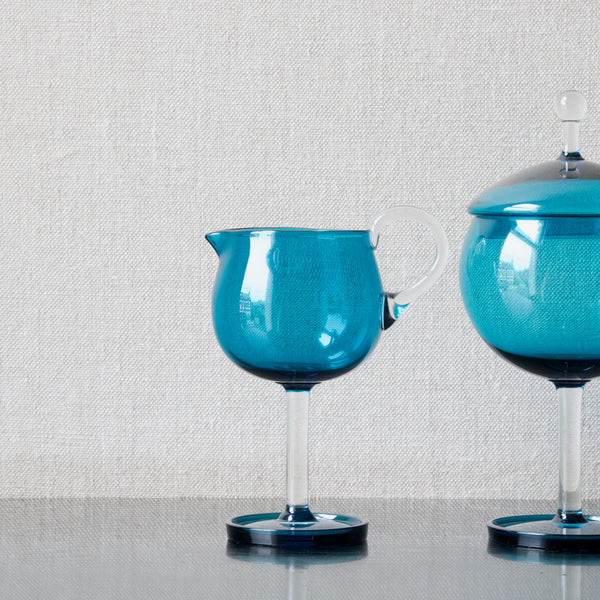Modernist blue glass 'Harlekiini' stemmed creamer by Nanny Still, Riihimaki Finland