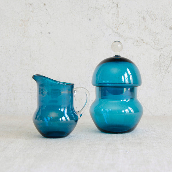 Pomona series sugar bowl and creamer by Helena Tynell, a rare Riihimäen Lasi glassware design with sculptural organic form