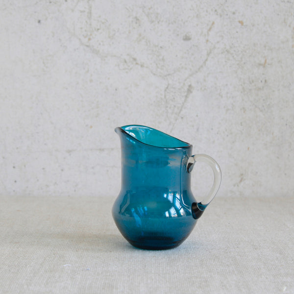 Hand-blown Finnish glass creamer from Helena Tynell’s Pomona series, celebrated for colour and generous proportions