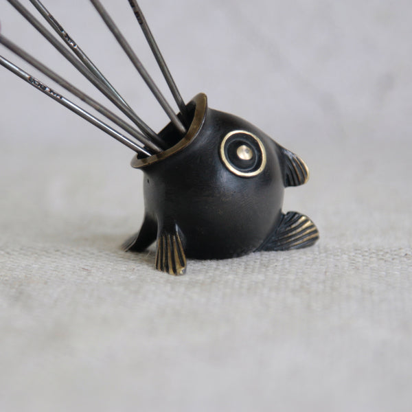 Mid-century brass fish toothpick holder by Richard Rohac, a sculptural Viennese collectible blending modernist form and Art Deco elegance.