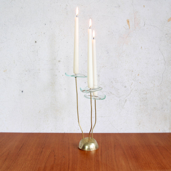Collectible Nordic brass and glass candlestick, available at Art & Utility UK design gallery.