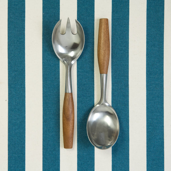 A serving fork and serving spoon from Jens Quistgaard's 'Fjord' flatware service designed in Denmark in the 1950s. This famous Scandinavian design is in the permanent collection of the MoMA in New York.