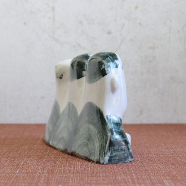 Side view of a rare post-war British Modernist porcelain sculpture The 8.15, highly sought after by collectors of English studio ceramics.