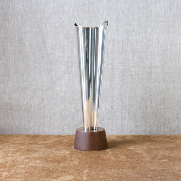A tall solid silver Scandinavian vase by Tapio Wirkkala. Manufactured by silversmiths Kultakeskus Oy who produced some of the best examples of Modernist metalware in silver in the twentieth century.