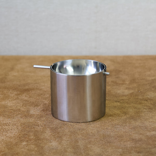 Side view of the Arne Jacobsen Cylinda-Line ashtray showing its pure geometric form.