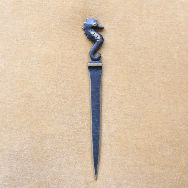 Mid-century Walter Bosse letter opener in the form of an aquatic seahorse, handmade by renowned maker Herta Baller.