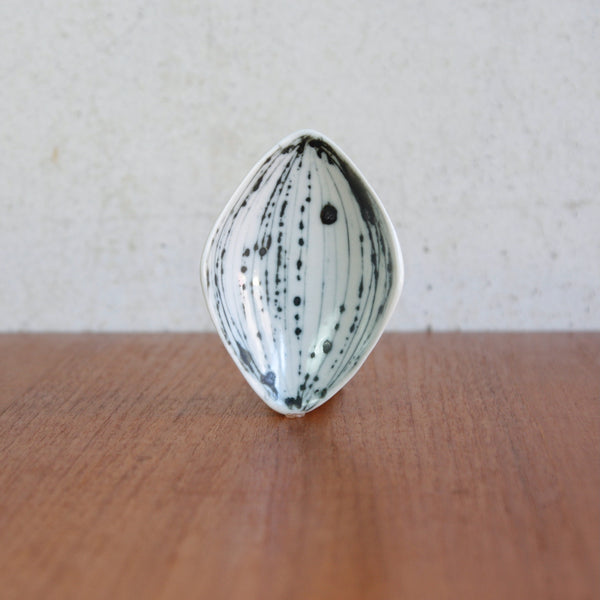 Shallow biomorphic bowl with gently upturned edges, designed by Susan Parkinson.