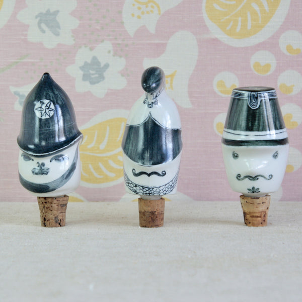 Parkinson Pottery bottle toppers circa 1955, showing the Policeman alongside Guy Neale's humorous Cavalry Officer and French Gendarme designs.