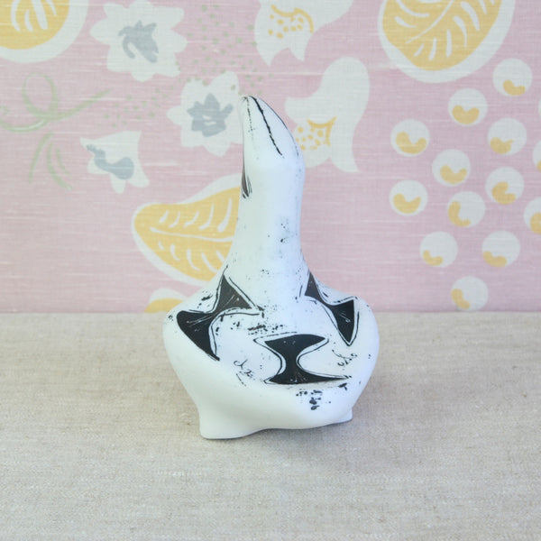 Back of a Modernist animal sculpture, Susan Parkinson white porcelain Toucan with freely painted abstract decoration