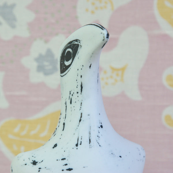 Close up of the head of a British mid-century ceramic sculpture, Susan Parkinson Large Bird with sweeping silhouette and exaggerated proportions