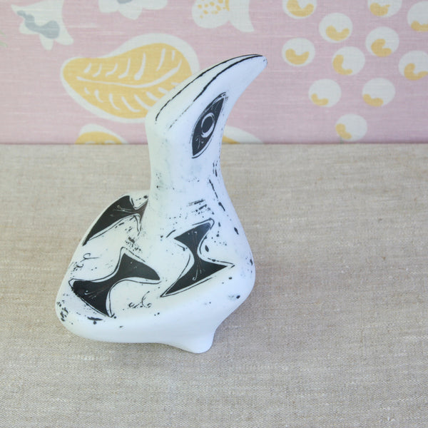 A small sculptural bird figurine in white with bold black painted markings. Festival of Britain-era design, Susan Parkinson Large Bird porcelain sculpture dating from circa 1953