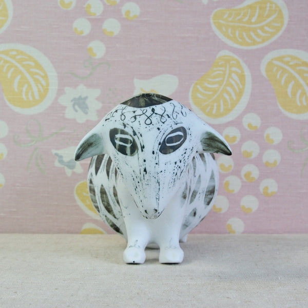Susan Parkinson Pregnant Ewe porcelain figurine with exaggerated swollen proportions and sculptural form