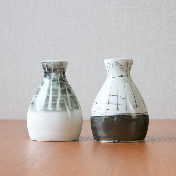 Mid-20th century British salt and pepper shakers by design Richard & Susan Parkinson, blending style and functionality effortlessly.