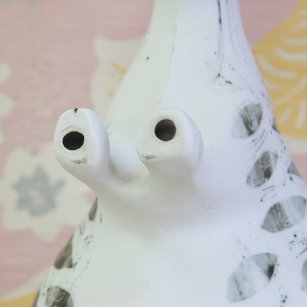 Close-up of the feet of a Susan Parkinson Sheep with expressive decoration reflecting the colourful post-war ceramics associated with the Picassoettes