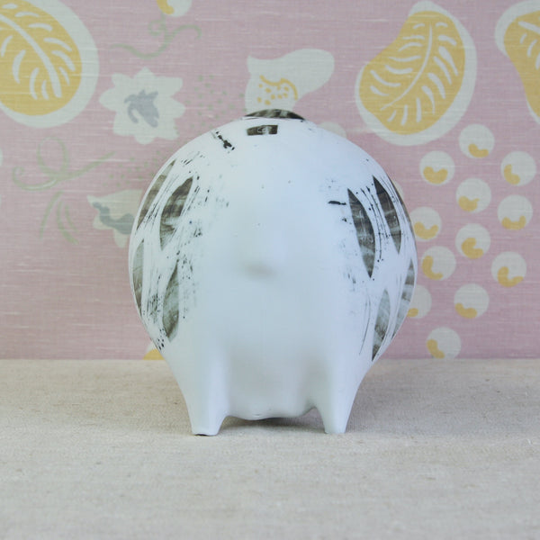 Head on shot of the rear or backside of a Susan Parkinson porcelain Sheep with lively abstract decoration recalling Margaret Hine and Nicholas Vergette