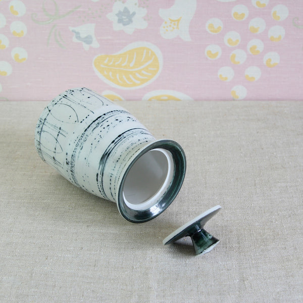 Susan Parkinson model 103 storage jar combining a classical vessel form with playful mid-century decoration